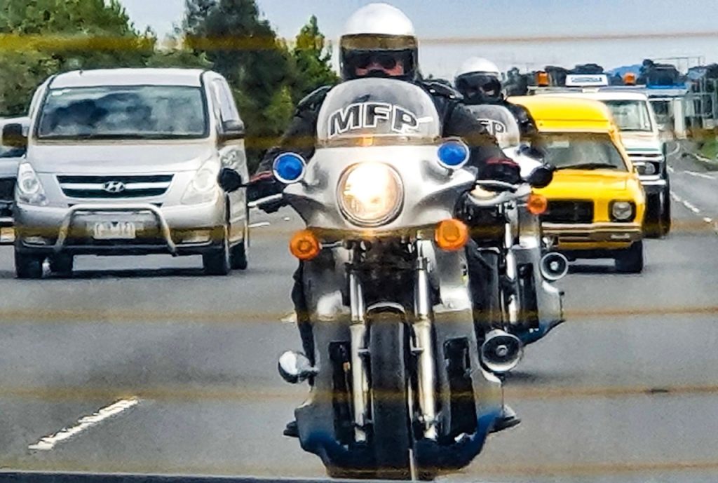 Mad-Max Goose Bikes in traffic